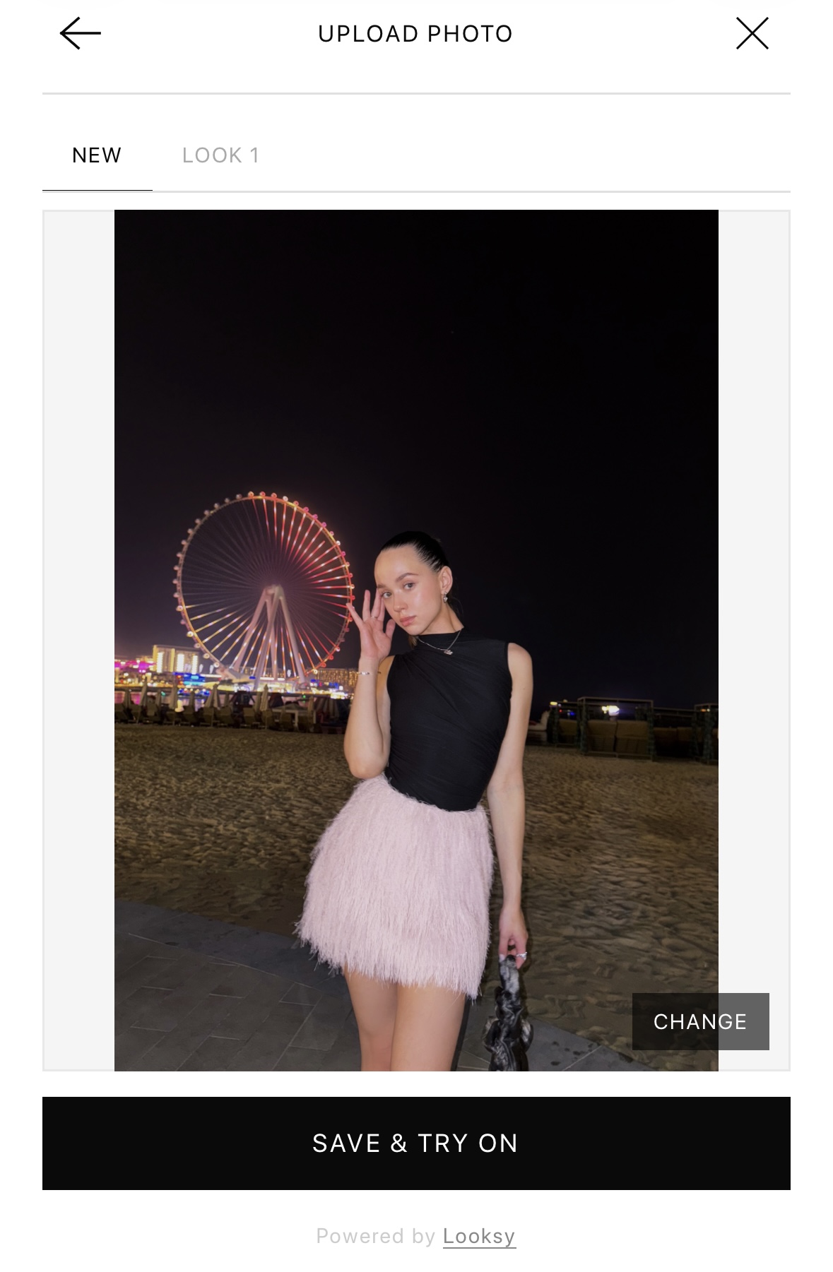 Upload a photo to the Looksy AI virtual fitting room Shopper uploading a full-length photo to the Looksy AI virtual fitting room