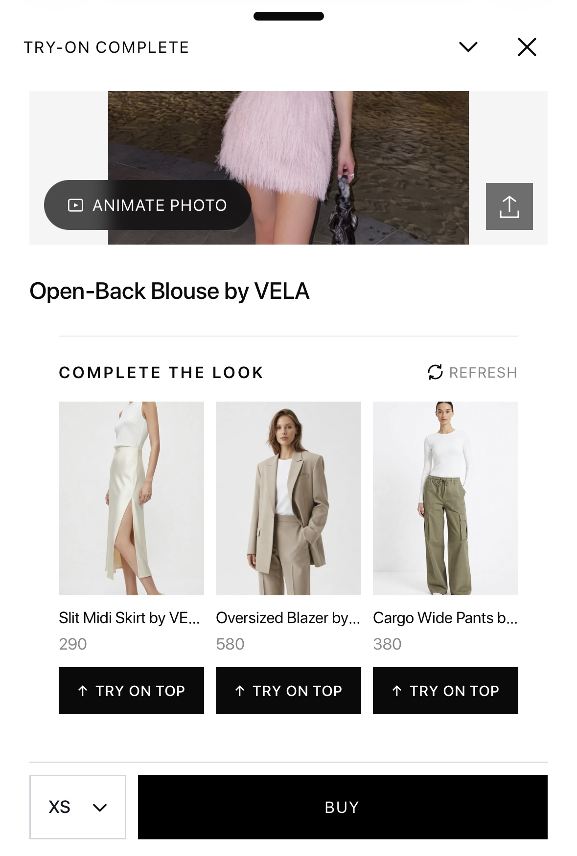 Add recommended fashion items with Looksy complete-the-look upsell Looksy complete-the-look recommendations shown after an AI virtual try-on